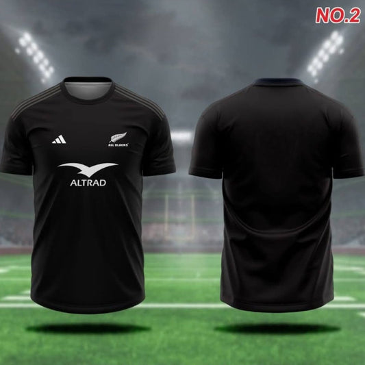 Black sports jersey with visible branding on a grass field background